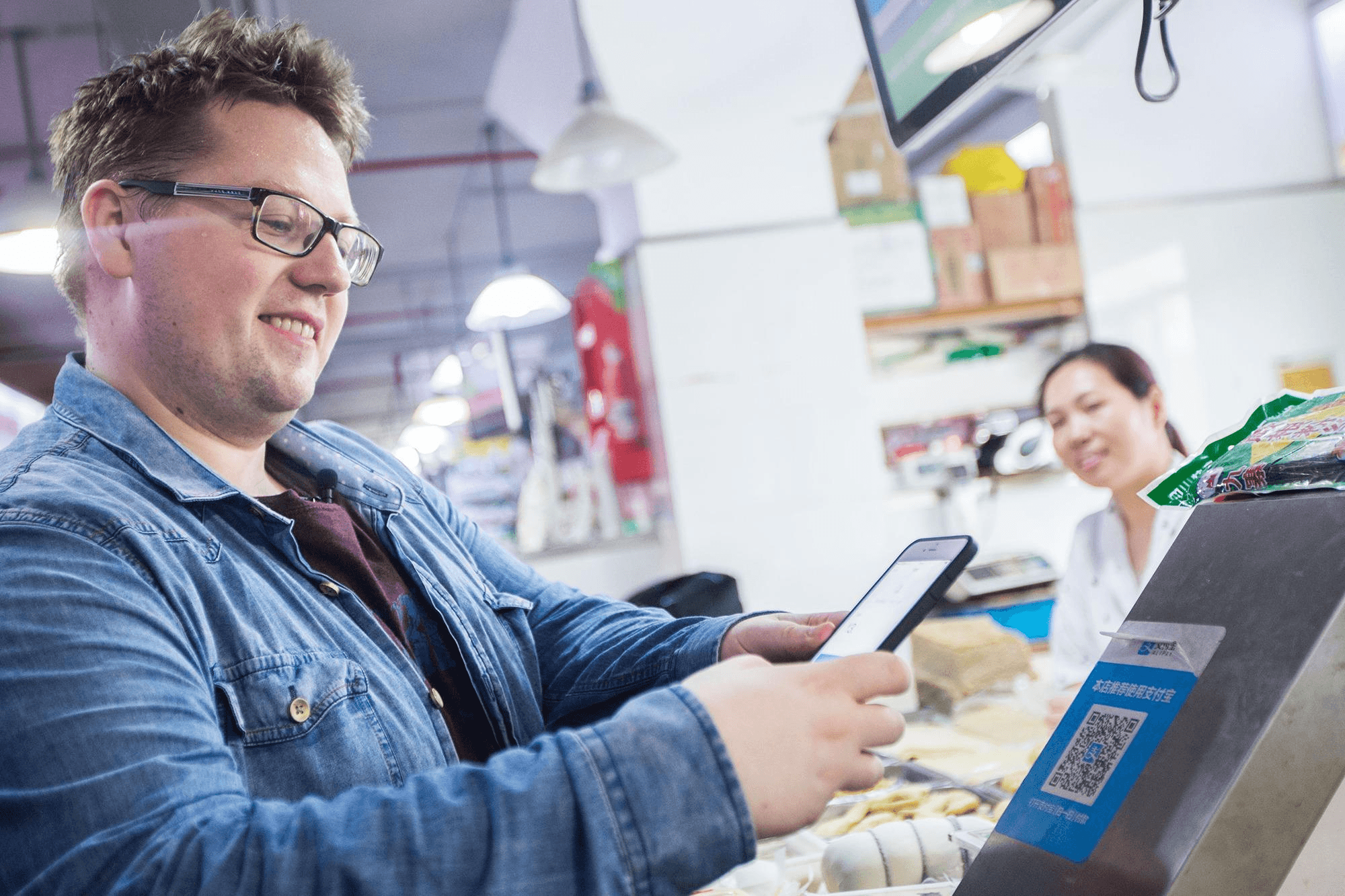 Mobile payment being used at a food stall in China.