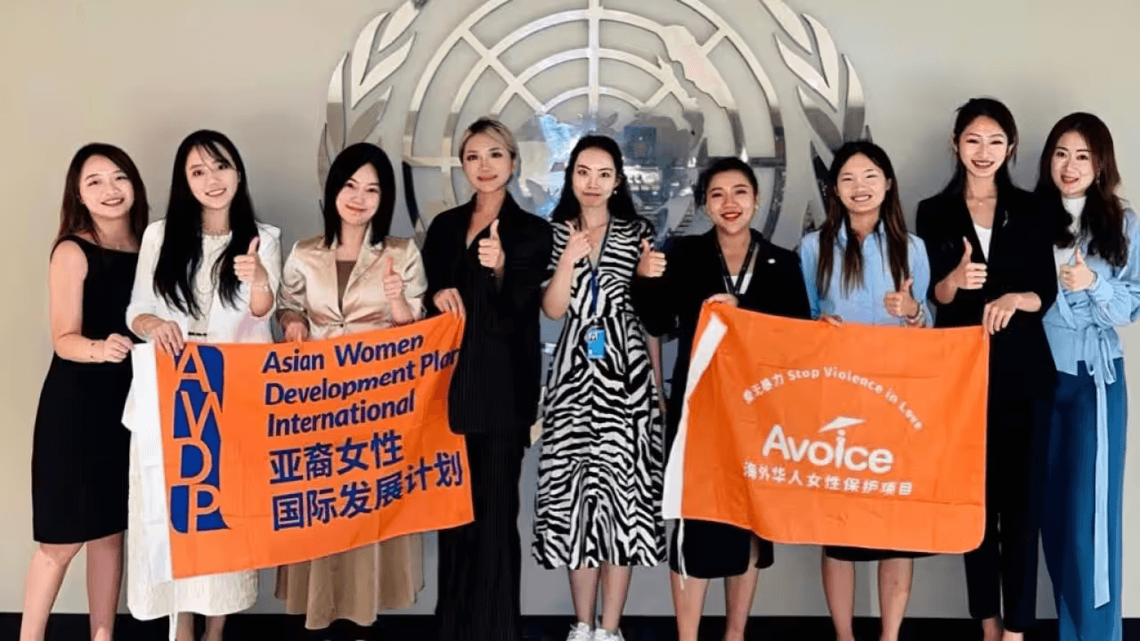 AWDPI women standing in front of an international emblem