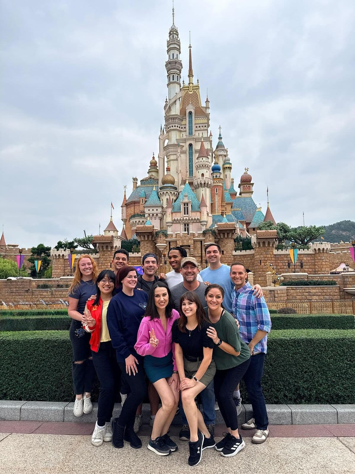 Group photo in front of Shanghai Disneyland castle.