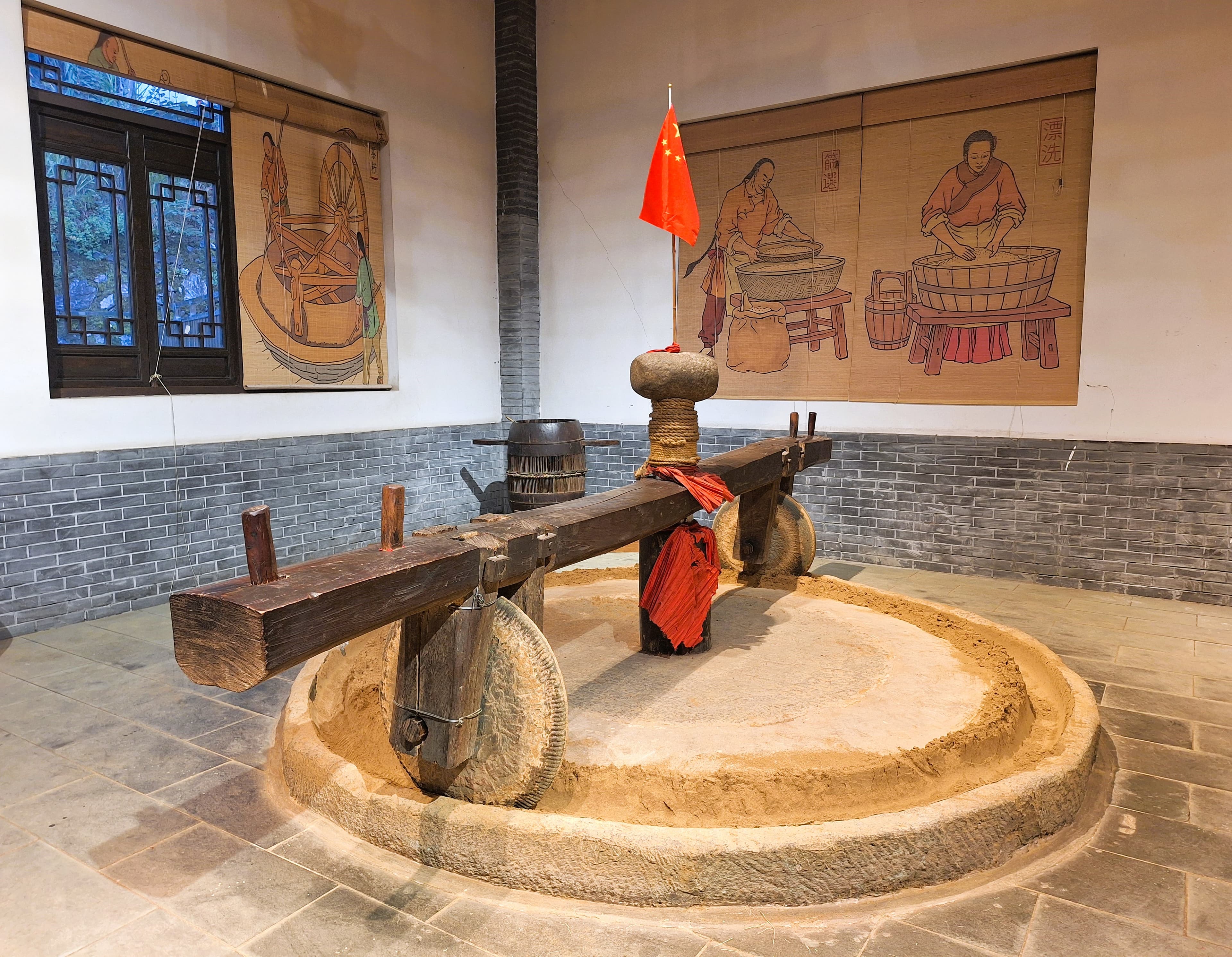 Traditional oil press at Taohua Island Oil Mill Museum.